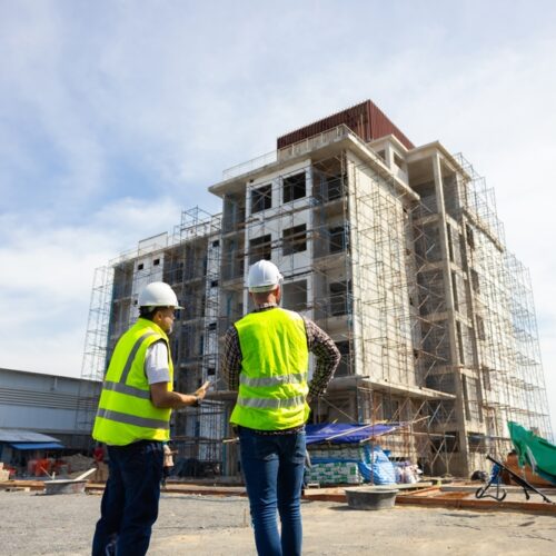 Back,View,Engineering,People,,Construction,Site.,Construction,Worker,Planning,And Back,View,Engineering,People,,Construction,Site.,Construction,Worker,Planning,And